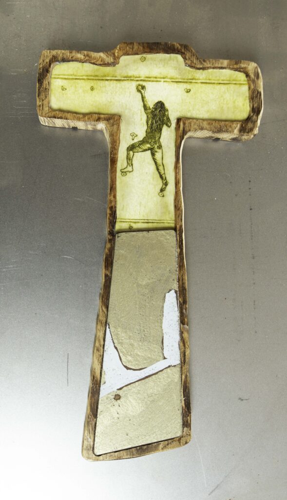 wooden sculpture with etch print, metal and encaustic technique. Copyright Stein Frayman 2025